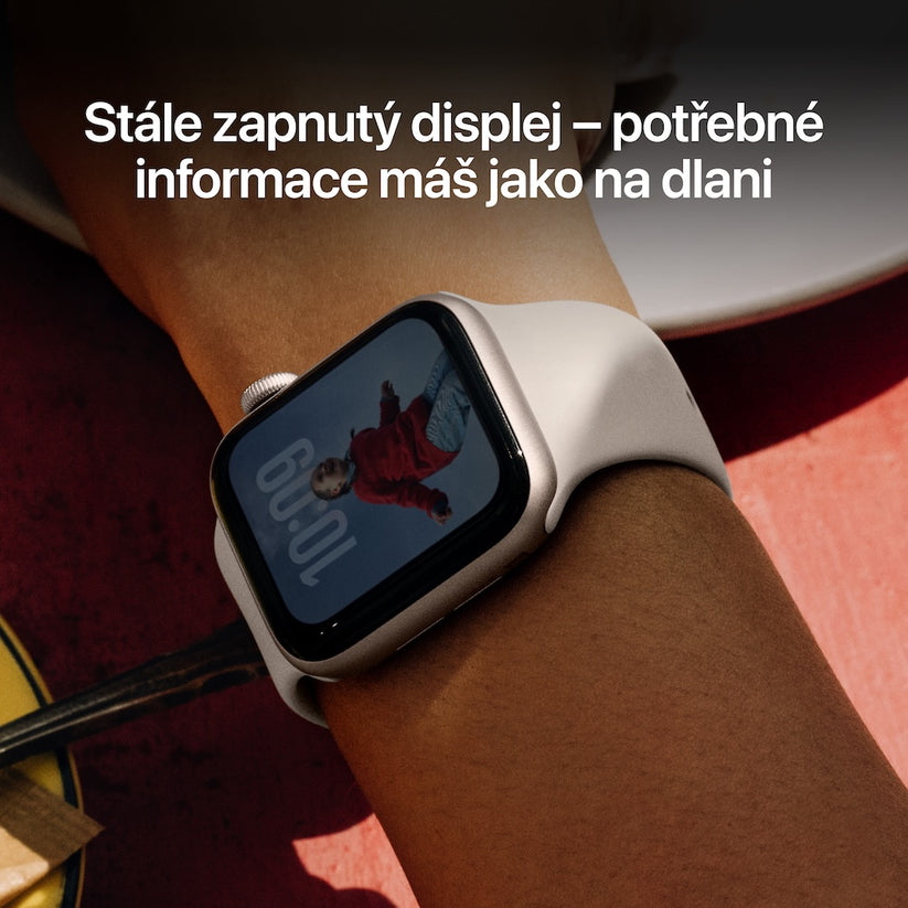 Apple Watch SE 3 GPS 44mm hvězdně bílé hliníkové pouzdro s hvězdně bílým sportovním řemínkem - M/L (otevřený) - iSTYLE.cz